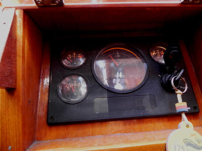 The engine instrument control panel is situated in the cockpit within easy reach of the Helmsman.